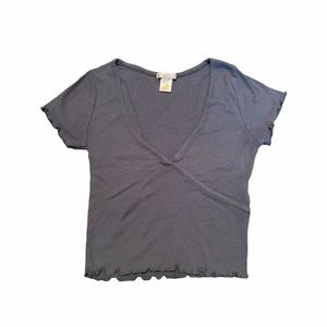 Tilly’s blue lettuce edge hem crop top.